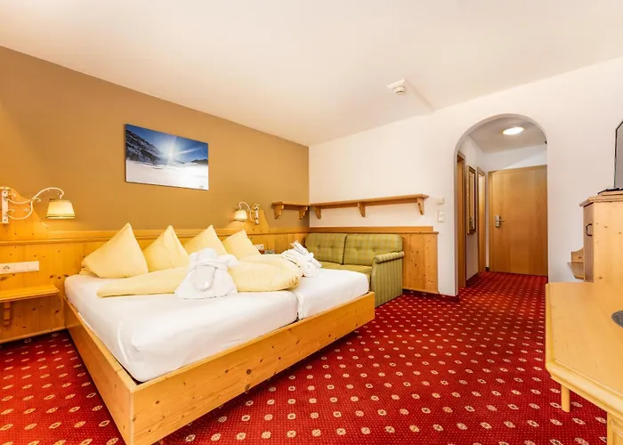 호텔 Alpen Wohlfuehlhotel Doerflwirt 4*