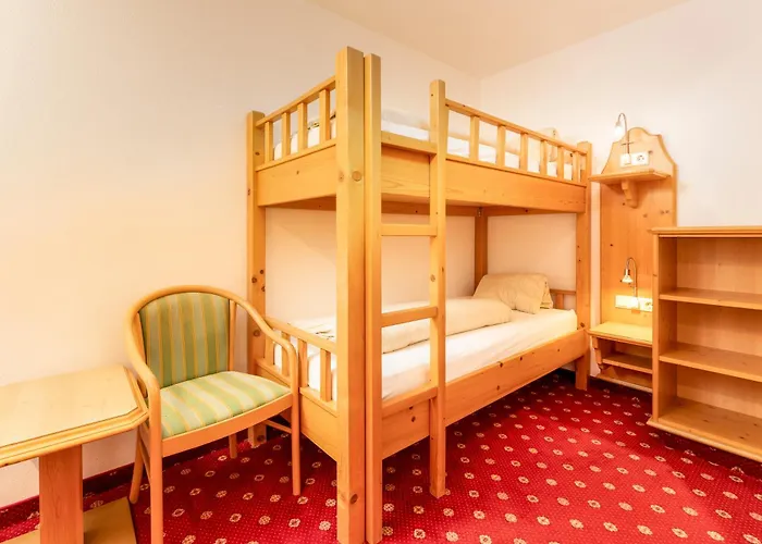 호텔 Alpen Wohlfuehlhotel Doerflwirt 4*