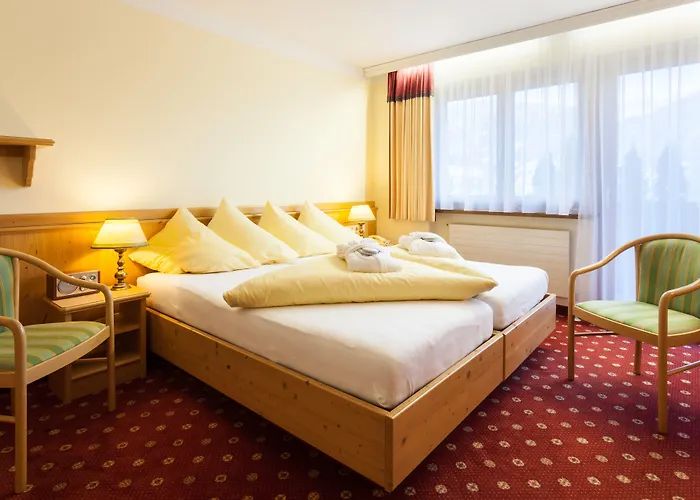 호텔 Alpen Wohlfuehlhotel Doerflwirt 4*