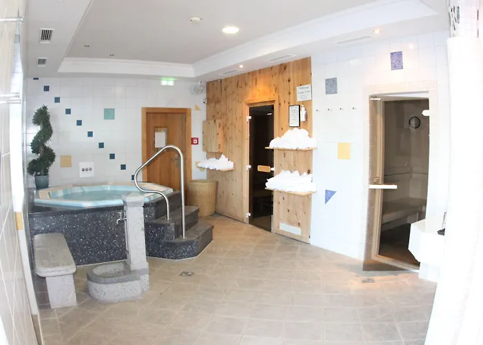 호텔 Alpen Wohlfuehlhotel Doerflwirt 4*